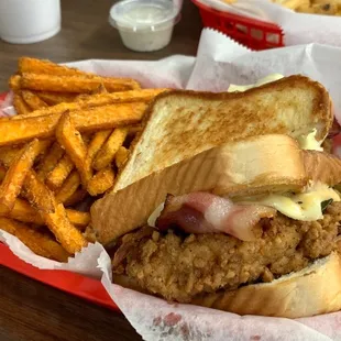The "Country Boy" sandwich with sweet potato fries. The sandwich had  Bacon, cheese, and collard greens!