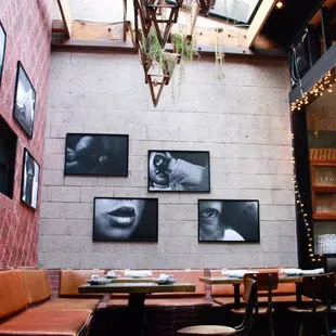 COZY CORNER WITH ROTATING ART INSTALLATION AT WALLFLOWER / photo: Kim Mahair