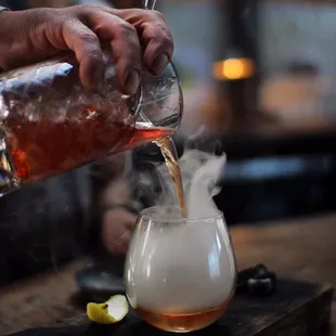 HUO (smoked woodford reserve, cherry heering, maraschino, sichuan peppercorn) / photo: Damon Keith Luu