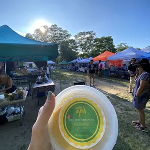 a person holding a plate of food