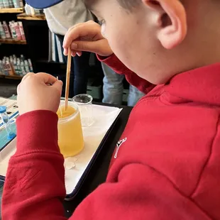 Stirring wax and scent together