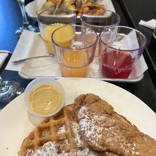 Chicken and waffle; flight of mimosas and menue