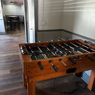 Foosball table located between the family dining and the bar.