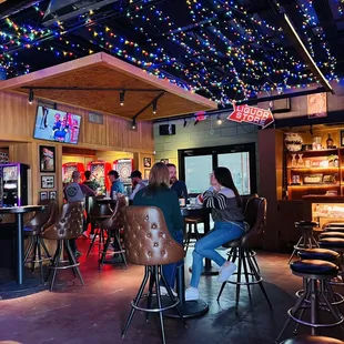 people sitting at the bar