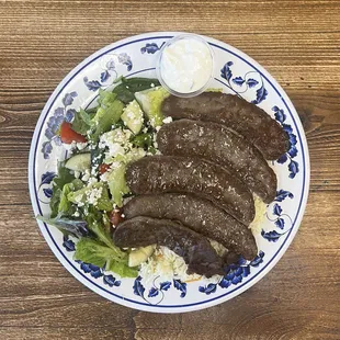 Gyros Plate - 5 strips of grilled beef &amp; lamb gyros served with rice, salad, tzatziki &amp; pita
