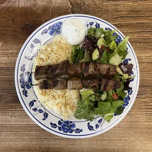 Beef Kabobs Plate - 2 beef skewers served with rice, salad, &amp; tzatziki &amp; pita