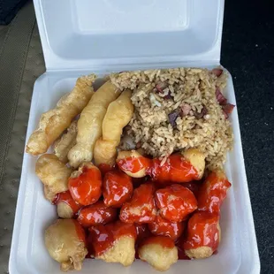 Sweet and sour chicken, fried shrimp and pork fried rice.