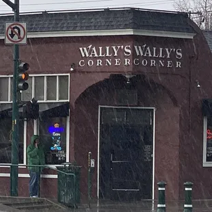 people walking in the rain