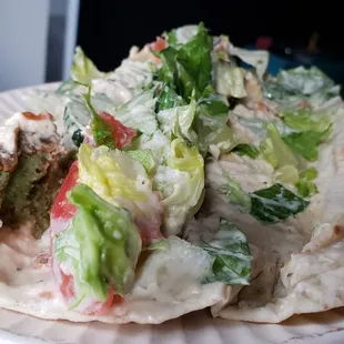 Falafel sandwich ($7), vegan by default. Above average, but not the best in town (Shish or Loon Deli are better).
