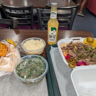 Hummus with spicy lamb. Tabouleh and potato salad and a new coconut pineapple drink.
