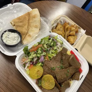 Lamb(gyro) platter. Rice, salad, pita. Lemon pepper wings.