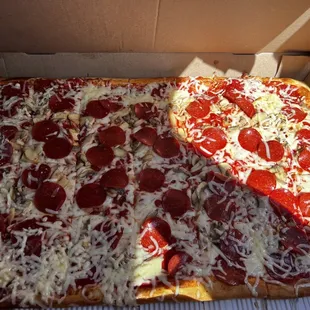 two slices of pepperoni pizza