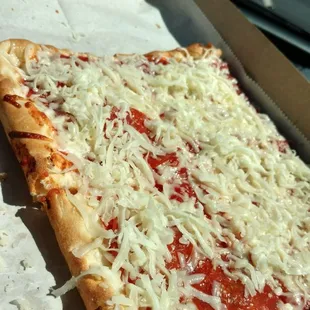 Crispy crust baked with sauce then hit with cold cheese. Sauce melts cheese as you eat. A perfect West Virginia-style pie. Delicious!