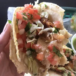 Fish taco partially eaten