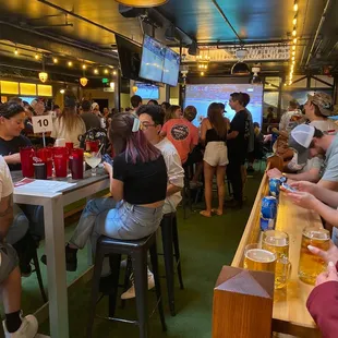 people sitting at the bar