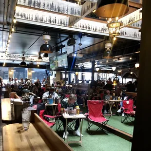 Love the tailgate setup, wonder how many hours before the game one has to arrive for those seats?!