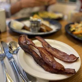bacon and eggs on a plate