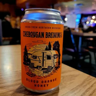 a can of beer on a table