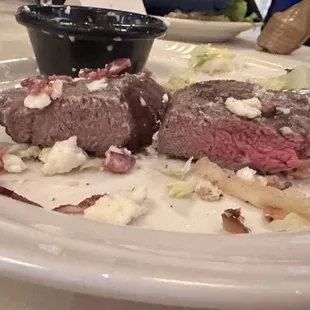 Inconsistent steaks. Left: well done, tasted like organ meat. Right: medium, tasted "off"