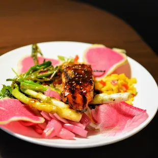 Korean BBQ Salmon - Rice blend, grilled scallion, sliced egg, pickled Asian slaw, pickled red onions, mango salsa, scallion, cilantro, sesam