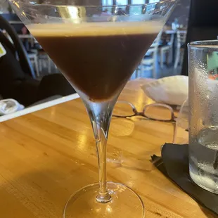 Really Walnut Grill,  you serve this half full glass charging $12.00?