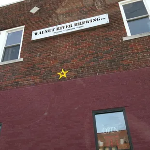 Look for the brick building on the side street.