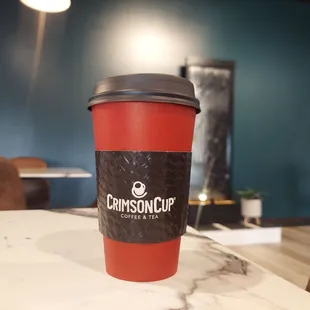 a cup of coffee on a table