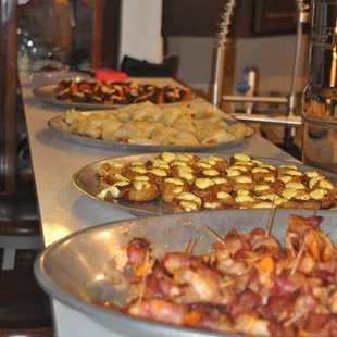 Top-bottom: lamb kefta on sweet potato crisp w/ harissa cream, pumpkin strudel, spicy crab cakes w/ saffron aioli, hab. shrimp/bacon