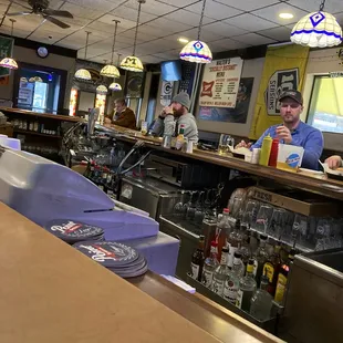 a man sitting at the bar