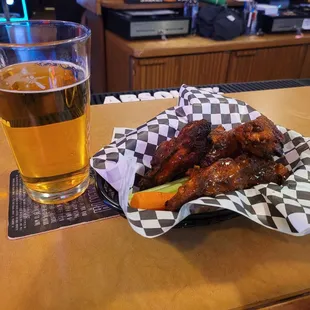 Hamm&apos;s and wings with Phoenix sauce.