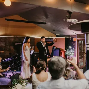 Welcome Speech from Bride and Groom on stage in patio