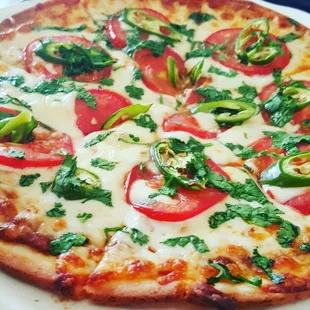 Gluten free margarita pizza with Serrano chili's