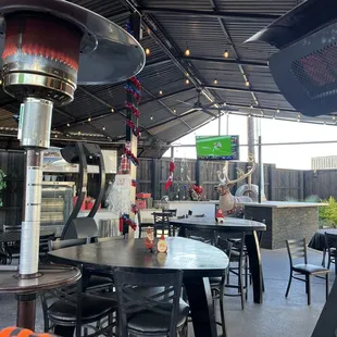 Heaters, TV with football playing, pizza oven