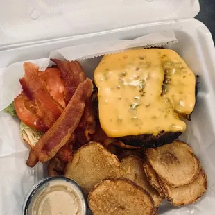 Walther's Big Burger with a side of Honey Mustard. Came with hand-cut broasted potatoes. Takeout Order