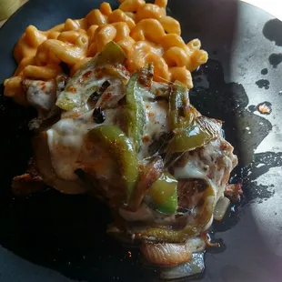 Smothered Grilled Chicken with Mac and Cheese.
