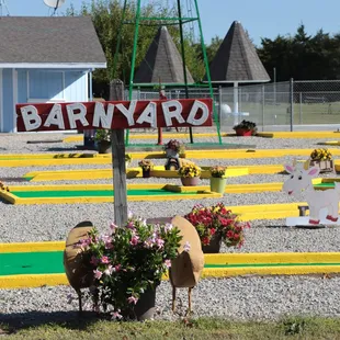 Barnyard 18- hole miniature golf  is a free amenity when camping at Walt&apos;s