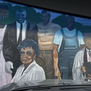 A tribute mural on the side of Walt&apos;s Grill, of several  notable Afro-Americans who were instrumental, pioneers in our country&apos;s history.