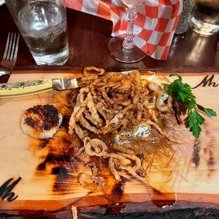 Bison filet w/ onion straws and a scallop
