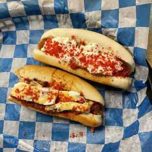 two hot dogs on a bun