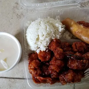 Orange flavored chicken w/veggie spring roll, egg drop soup and white rice