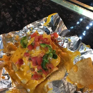 She ate my nachos. Another beer please.