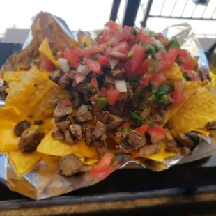 Carne asada nachos 7 bucks