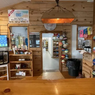 View from back room lots of knickknack for sale.  You order food in front and they bring it to you in back!