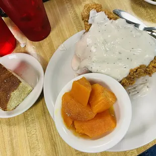 Chicken fried chicken, candied yams, and cornbread