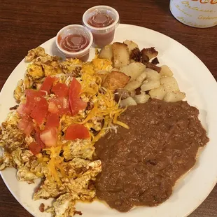 Chorizo and egg breakfast plate. I added cheese and the diced tomato.