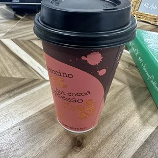 a coffee cup on a table