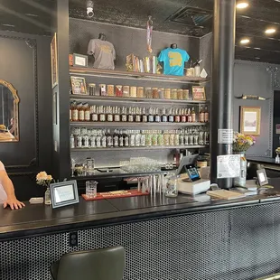 a woman behind the bar