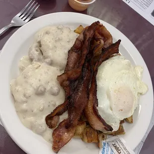 Farmers breakfast - bacon, eggs, biscuits and gravy, home fries