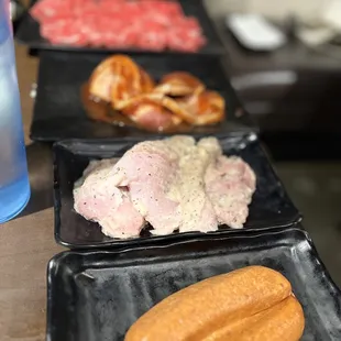 All you can eat, cook your own food, beef brisket, pork belly, garlic, chicken, sausage link