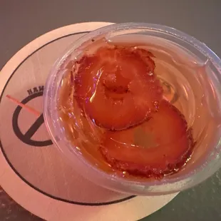 Jello shot fundraiser with strawberries and champagne.